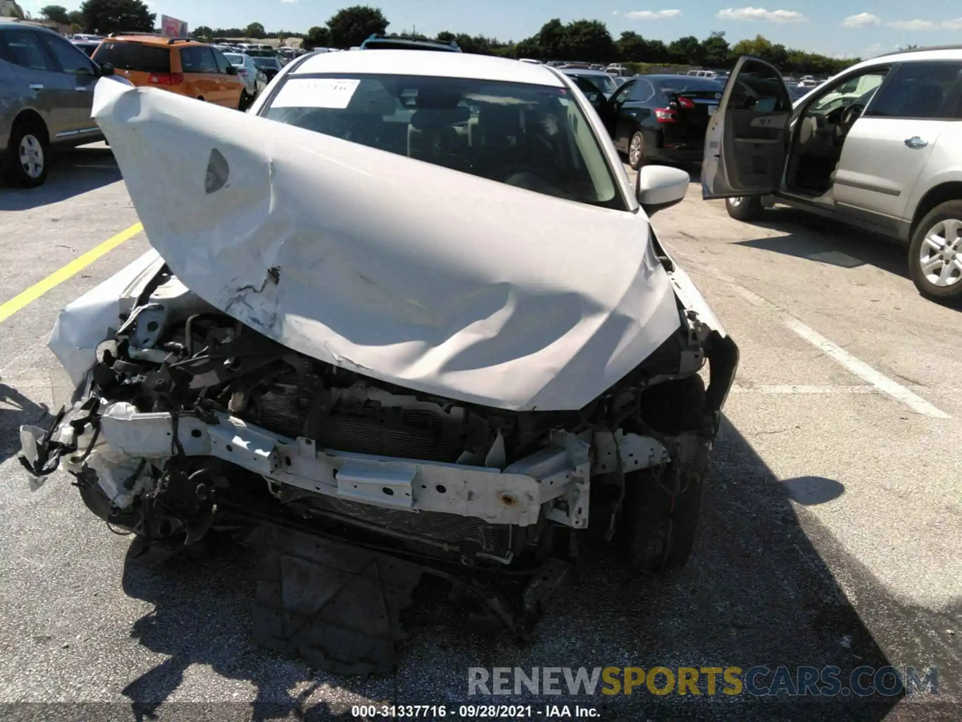 6 Photograph of a damaged car 3MYDLBYV0KY513733 TOYOTA YARIS SEDAN 2019