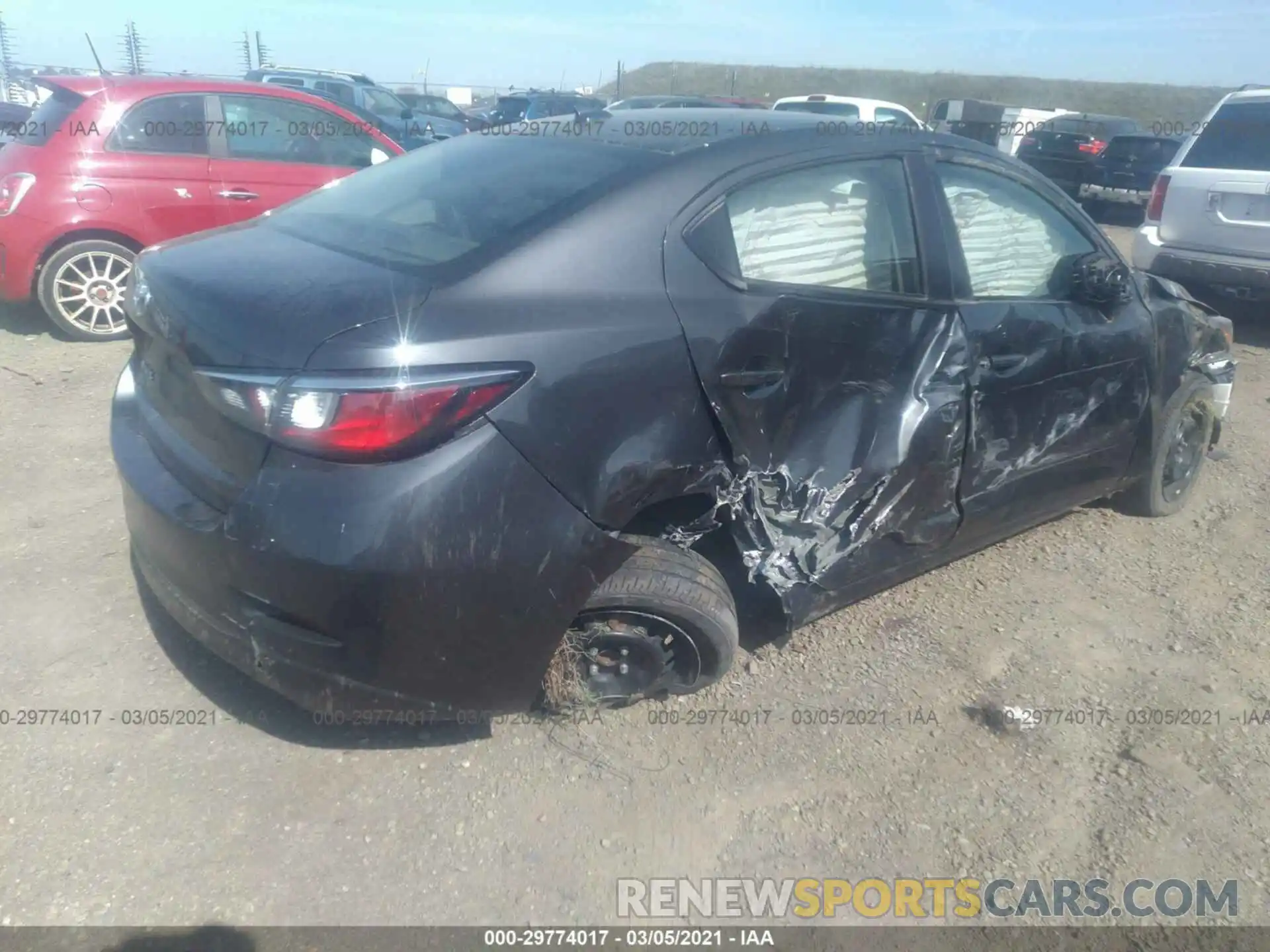 4 Photograph of a damaged car 3MYDLBYV1KY515507 TOYOTA YARIS SEDAN 2019