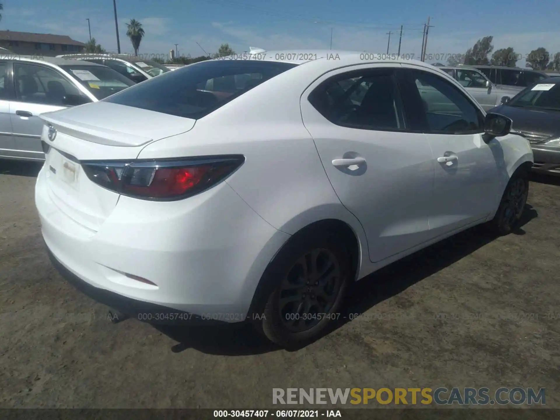 4 Photograph of a damaged car 3MYDLBYV4KY516053 TOYOTA YARIS SEDAN 2019