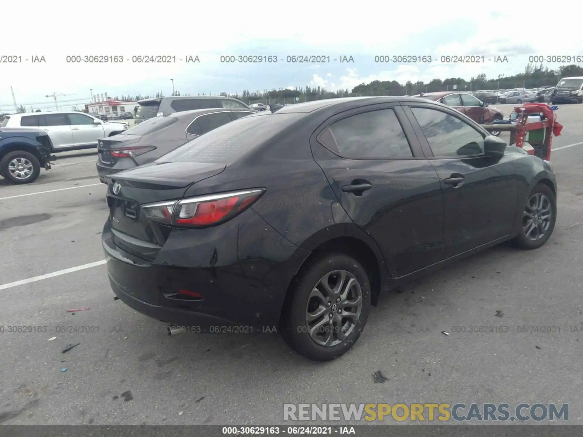 4 Photograph of a damaged car 3MYDLBYV5KY518653 TOYOTA YARIS SEDAN 2019