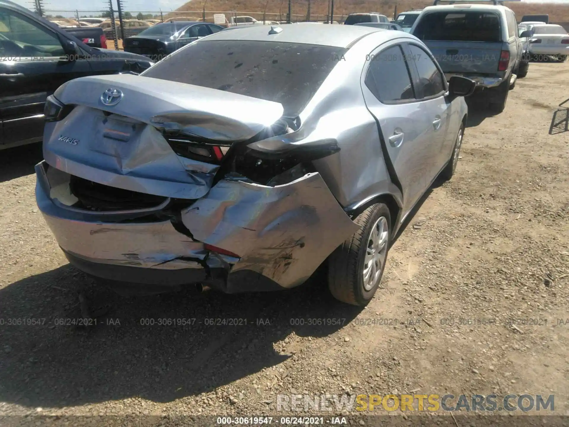 4 Photograph of a damaged car 3MYDLBYV6KY519813 TOYOTA YARIS SEDAN 2019