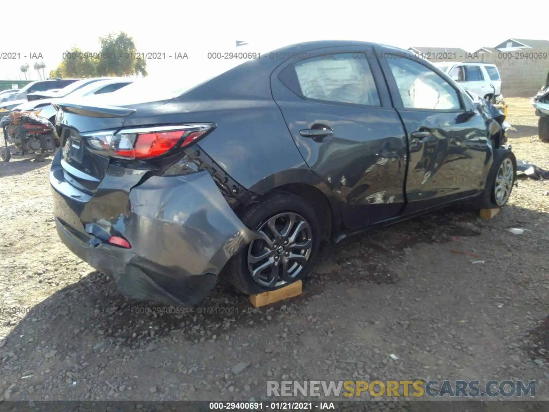 4 Photograph of a damaged car 3MYDLBYV6KY524297 TOYOTA YARIS SEDAN 2019