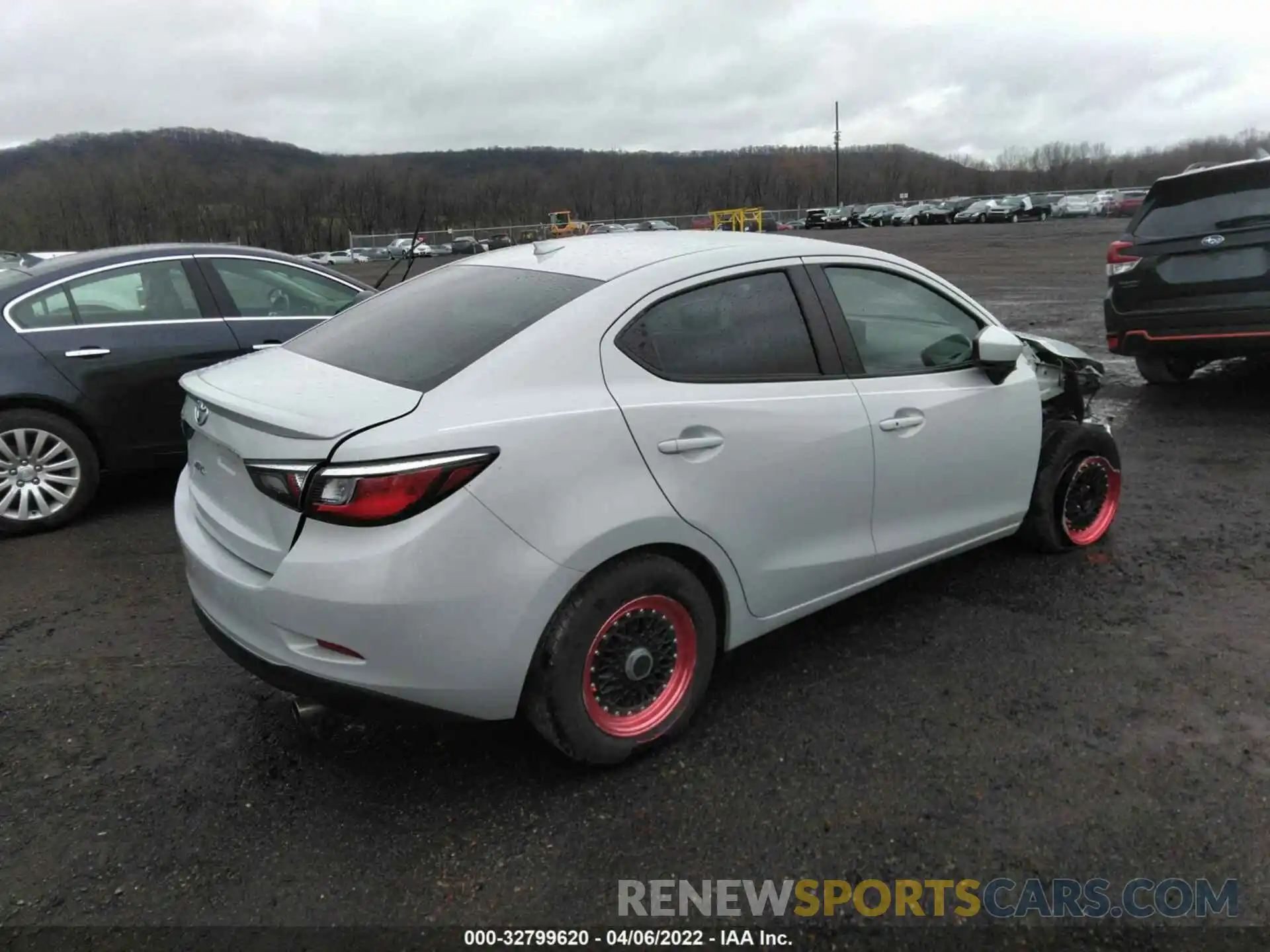 4 Photograph of a damaged car 3MYDLBYV9KY511186 TOYOTA YARIS SEDAN 2019