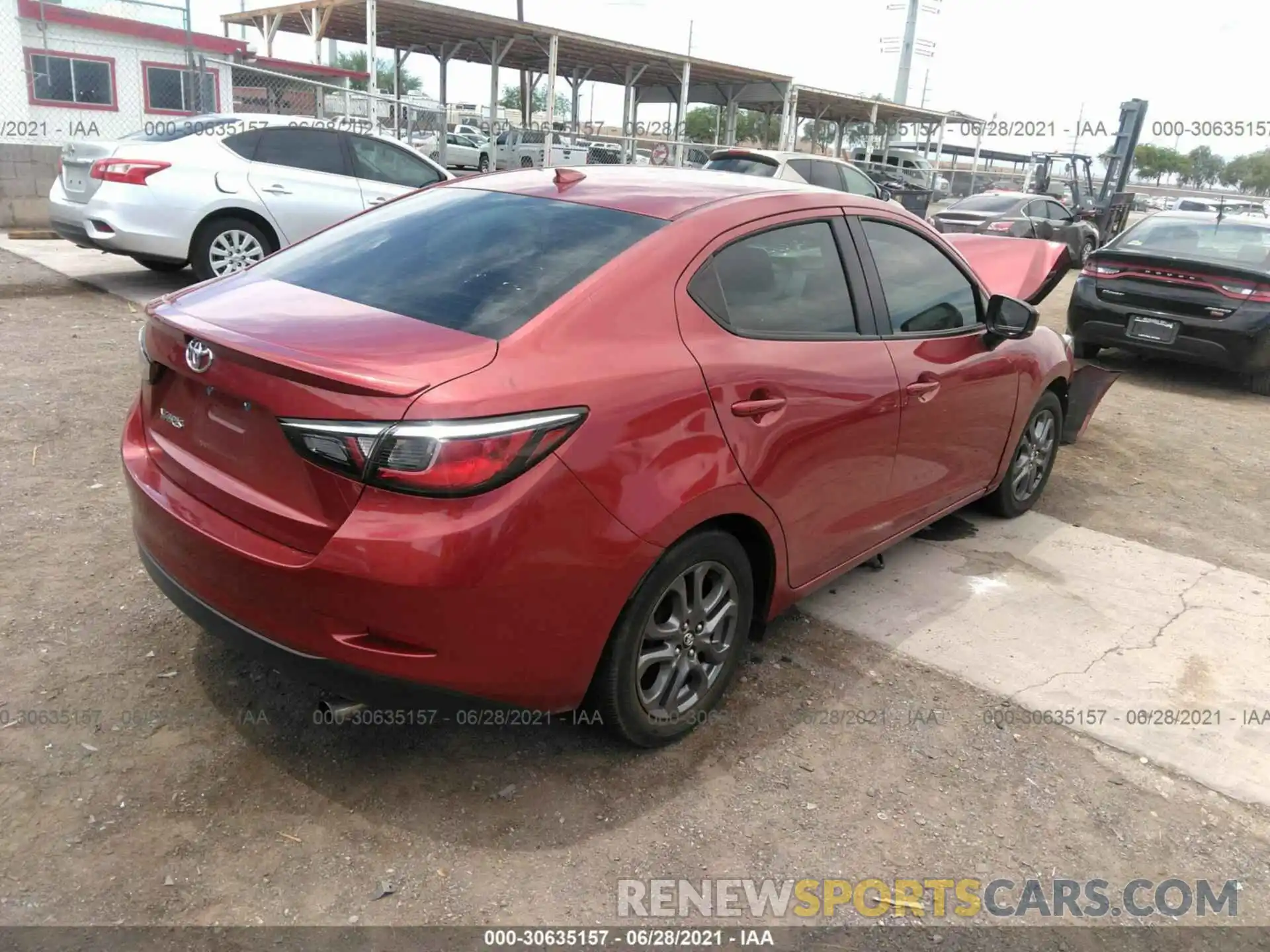 4 Photograph of a damaged car 3MYDLBYV9KY524326 TOYOTA YARIS SEDAN 2019