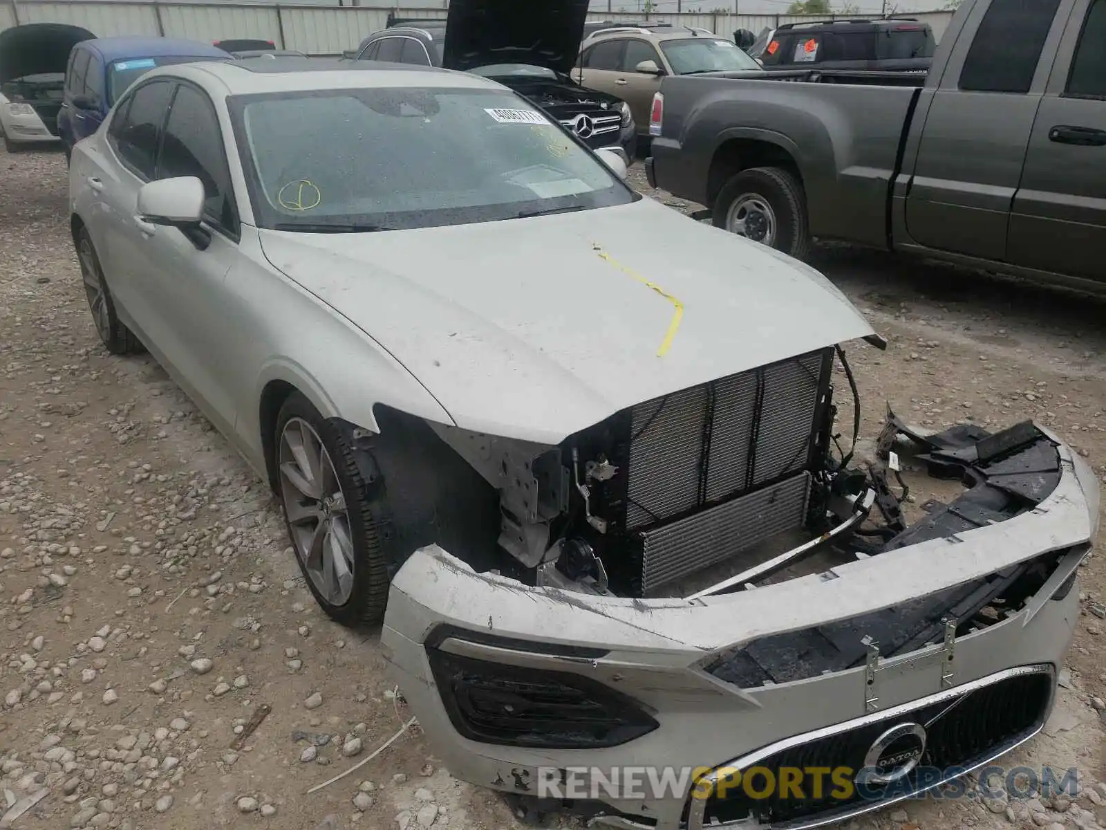 1 Photograph of a damaged car 7JR102FK9KG000678 VOLVO S60 2019