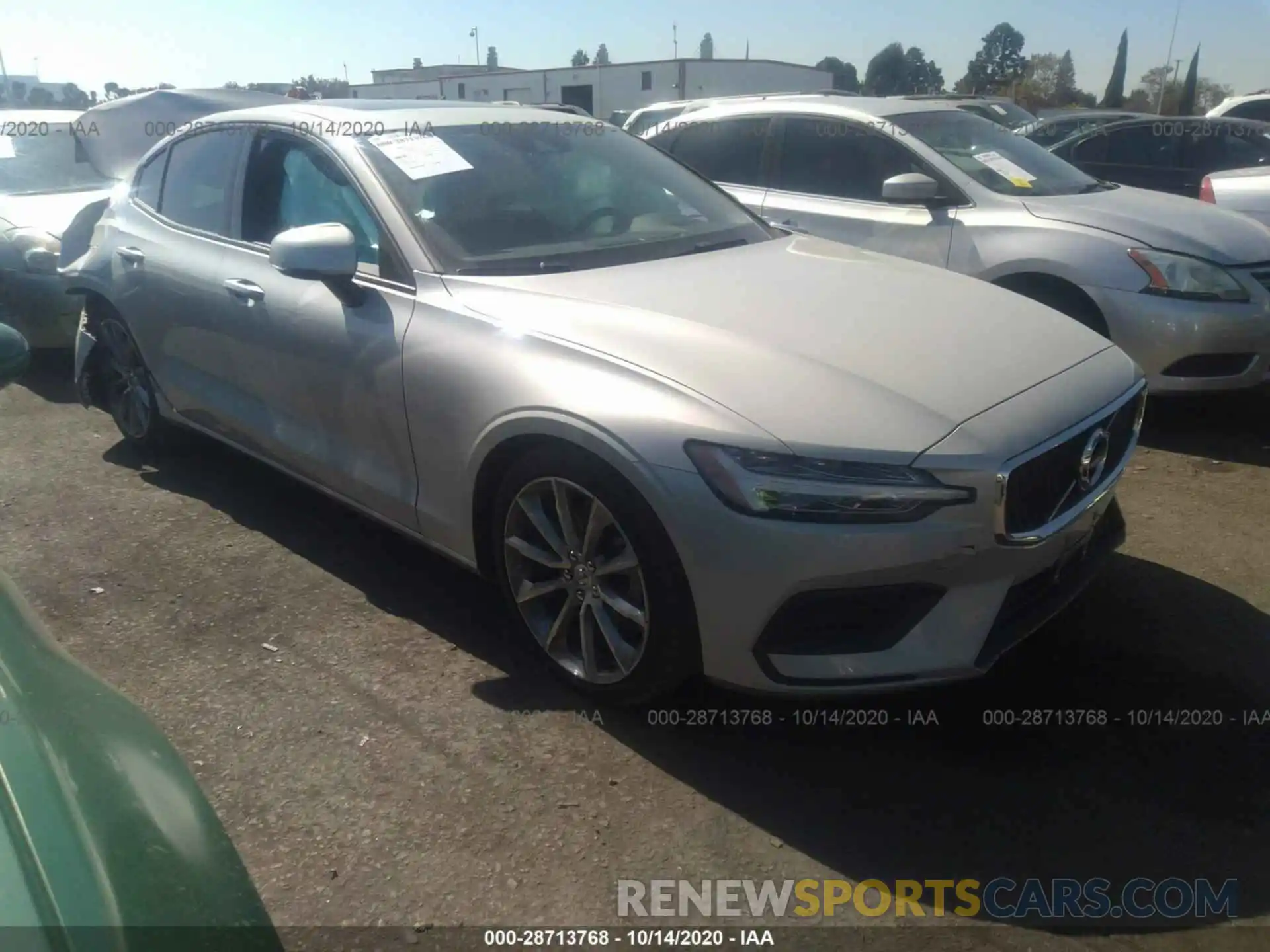 1 Photograph of a damaged car 7JR102FKXKG000818 VOLVO S60 2019