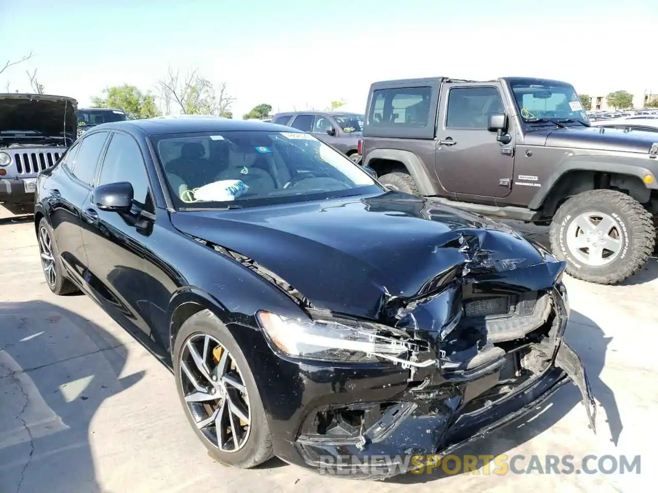 1 Photograph of a damaged car 7JRA22TK0KG015651 VOLVO S60 2019