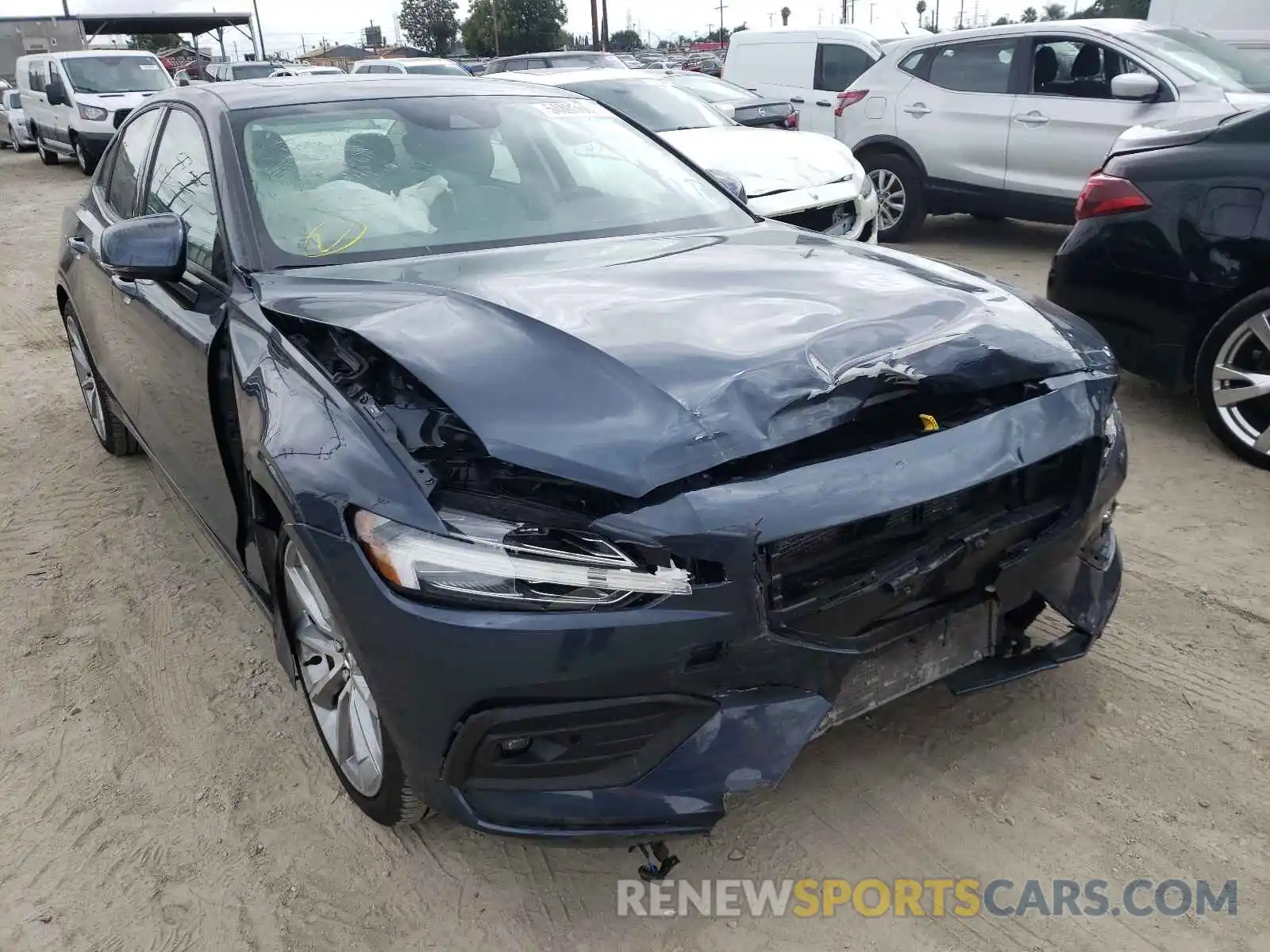 1 Photograph of a damaged car 7JR102FKXMG102476 VOLVO S60 2021